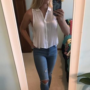 White sleeveless blouse